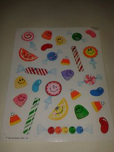 an assortment of stickers on a white surface