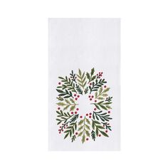 a white towel with holly and berries on it