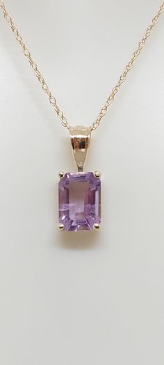 "AMETHYST 14k Yellow Gold Pendant / Necklace. Natural stone. 18\" gold Chain necklace. Rectangle Gemstone Jewelry. Amethyst. February Birthday Stone. Product Info: - Stone: Rectangle Amethyst. - Color: Purple. - Pendant Measures: 12mm x 4mm. - Stone Measures: 5x4mm - Stone Carat: 1.10 - Metal: 14k Yellow Gold. - Chain Length: 18 inches Rope Chain. - Made in USA. - Nice Gift Box Included." Stone Lockets Pendants, Rectangular Gemstone Necklace For Anniversary, Prom Jewellery, Birthday Stone, Purple Pendant, Locket Design, Lapis Pendant, February Birthday, Purple Jewelry