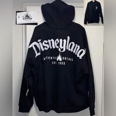 **Note** Runs One Size Bigger Than Your Normal Size Pick Your Size Available Xs S M & Xl If You’re Size S Pick Size Xs Enjoy The Magic Of Disneyland With This Authentic Disney Parks Hoodie In Black. The Full Zip Design Is Perfect For Both Men And Women, With A One Size Fits All Option For Easy Wear. The Hoodie Features The Iconic Disney Logo, Making It A Must-Have For Any Fan Of The Brand. This Hoodie Is Brand New With Tags, Ensuring Its Quality And Authenticity. It Is A Great Addition To Any Ac Oversized Hoodie Disney, Cheap Disney Long Sleeve T-shirt, Oversized Disney Hoodie, Affordable Long Sleeve Disney T-shirt, All Black Disney Outfit, Disneyland Hoodies, Disneyland Merch, Disneyland Hoodie, Hoodies Disney