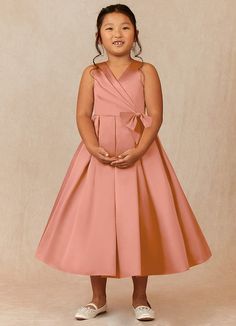 Ronda is our adorable flower girl dress cut from satin. She features a pleated V-neckline and a scoop back. The look is complete with an A-line skirt adorned with two bows. Special Event Dresses Parties, Satin Flower Girl Dresses, Short Bride, Military Ball Dresses, Special Event Dresses, Sage Dress, Mai Tai, Ankle Length Dress, Ivory Dresses