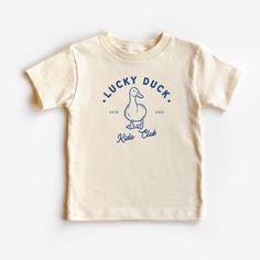 This cute Lucky Duck Kids Club Shirt is 100% cotton, has a tear away tag for your child's comfort and comes in 3 natural Bella Canvas colors. In sizes 2T-5T, make this cute duck shirt the best addition to your child's duck theme birthday party or a perfect gift or trendy tee to wear year round! DETAILS .100% Cotton .Bella Canvas tee .Tear away label .Runs true to size .Props in any photos are not included and are for styling purposes only .Colors may slightly vary from styled photos  SIZING This graphic tee design will be printed on a Bella Canvas shirt that is high quality, comfortable and so soft! Sizing runs true to size (please refer to the size chart for exact measurements). If you'd like a more oversized look I would recommend ordering a size up. If you prefer a tighter fit, size dow Duck Theme Birthday Party, Lucky Duck Birthday, Duck T Shirt, Duck Shirt, Silly Shirt, Duck Birthday, Lucky Duck, Birthday Party Shirt, Club Shirts