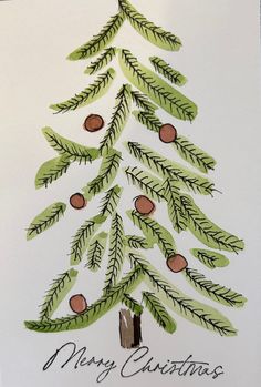 a christmas card with a pine tree and acorns