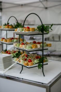 an assortment of appetizers are displayed on a table