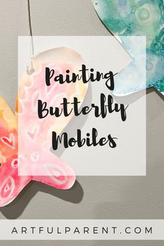 the words painting butterfly mobiles are painted in different colors