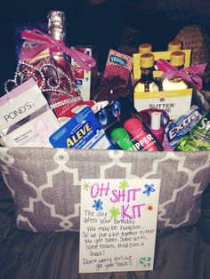 a basket filled with lots of different items on top of a bed next to a sign that says, what i made for my best friends 21st birthday