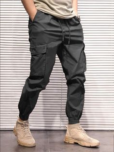 Mens Style Cargo Pants, Nike Cargo Pants Outfit Men, Cargo Pants Ideas Men, Cargo Joggers Outfits Men, Men’s Cargos, How To Style Cargo Pants Men, Men’s Cargo Pants Outfit, Men’s Pants, Black Men Outfits Street Style