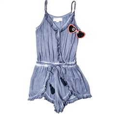 Darling Vintage Havana Blue Denim Look Spaghetti Strap Shorts Romper With Spaghetti Straps. Never Worn! V-Neck With Ruffles. Ruffles Continue Down The Torso And Are Featured On The Shorts And Short Bottoms. Drawstring Tie At Waist With Navy Blue Tassel Ends. Has Stylish Distressed Print. So Soft And Comfy For Spring Through Fall Outings Or For Everyday! Great For Beach, Day Or Nights Out, Summer Parties. 100% Rayon. Great Condition - See Photos. Size Medium Measurements Laying Flat. See Measurem Trendy Washed Blue Jumpsuits And Rompers For Summer, Summer Washed Blue Cotton Jumpsuits And Rompers, Summer Cotton Jumpsuits And Rompers In Washed Blue, Summer Washed Blue Fitted Jumpsuits And Rompers, Fitted Washed Blue Jumpsuits And Rompers For Summer, Casual Cotton Jumpsuits And Rompers With Spaghetti Straps, Casual Cotton Jumpsuits With Spaghetti Straps, Cotton Beach Jumpsuits With Spaghetti Straps, Cotton Spaghetti Strap Jumpsuits And Rompers For Beach