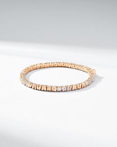 Crafted in 18-karat gold, this tennis bracelet incorporates our beloved baguette diamonds unevenly set while interchanging them with sections of gold all the way around. We love this piece for its seamless design and everyday wearability. The perfect baguette tennis bracelet to instantly elevate any outfit, casual or formal. Details 18k yellow gold, rose gold or white gold 2.00 carats of white diamond baguettes Bracelet measures 7" inches in length Box clasp with safety lock fastening 5mm width Fine Jewelry Rose Gold Diamond Bracelet With Baguette Cut, Rose Gold Baguette Cut Diamond Bracelet, Rose Gold Bracelets With Baguette Diamonds, Timeless Baguette Diamond Bangle Bracelet, Timeless Everyday Luxury Tennis Bracelet With Baguette Diamonds, Fine Jewelry Tennis Bracelet With Baguette Diamonds, Yellow Gold Tennis Bracelet With Single Cut Baguette Diamonds, Yellow Gold Tennis Bracelet With Baguette Cut Single Diamonds, Timeless Baguette Cut Jubilee Tennis Bracelet