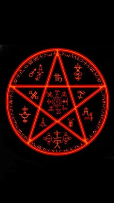 a red pentagramil with chinese writing on it in the middle of a black background