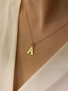 "ABOUT PRODUCT This 14K Solid Gold Initial Pendant necklace is beautifully designed and hand crafted with our associates to make this a special gift for your loved ones. Knowing the value of our customers, We prepare each piece with extra care and attention. ITEM DETAILS Material: 14K Gold Approx: 1.80 gram Available colors: Gold, Rose Gold, White Gold Available Sizes: 14\" to 20\" ✪ 14k Solid Gold ( Certification will be included with your order ) ✪Available 14K White, Yellow, Rose Gold (also i Handmade Gold Initial Necklace In Minimalist Style, Handmade Initial Pendant Name Necklace For Anniversary, White Gold Initial Pendant Necklace As Gift, Handmade Gold Minimalist Initial Necklace, Sterling Silver Initial Necklace For Gifts, Everyday White Gold Initial Pendant Necklace, Handmade 14k Gold Charm Necklace For Everyday, Yellow Gold Initial Pendant Necklace As Gift, Minimalist Name Pendant Necklace As Gift For Her