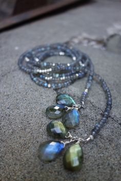 Labradorite wrap around long beaded necklace with stones tassels Labradorite gemstone Sterling silver Approx 44 1/2 in long  You may choose to wear it with this earrings: https://www.etsy.com/listing/633651539/labradorite-sterling-silver-long?ref=shop_home_active_1 Ready to ship Gemstone Beads Dangle Jewelry For Meditation, Hand Wrapped Labradorite Bead Jewelry, Bohemian Lariat Jewelry With Faceted Beads, Spiritual Lariat Jewelry With Faceted Beads, Bohemian Briolette Gemstone Beads Jewelry, Spiritual Hand-strung Lariat Jewelry, Labradorite Beads Necklace, Adjustable Beaded Labradorite Necklaces, Adjustable Labradorite Gemstone Bead Necklace