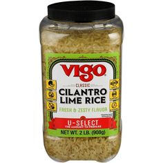 a jar filled with rice sitting on top of a white table