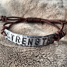 STRENGTH  ID Bracelet, Pewter, leather, Hand Stamped, Inspirational jewelry, bracelet with words, Adjustable Silver Leather Bracelet Hand Stamped, Metal Stamped Leather Bracelet, Everyday Adjustable Leather Bracelet Hand Stamped, Rustic Brown Stamped Leather Bracelet, Western Style Sterling Silver Bracelet Gift, Stamped 925, Sliding Knot Closure, Id Bracelets, Faith Shirt, Sliding Knot