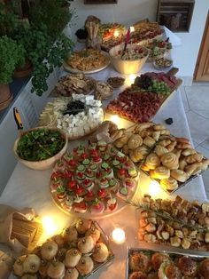 a table filled with lots of different types of food