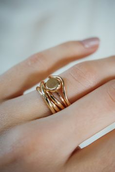 A curved arc stacking ring made from 14K Gold Fill Metal. After countless requests and some fine tuning, we finally perfected this ring shape! The Teardrop Ring stacks with all of our rings beautifully. It adds dimension to any stacking rings you wear daily but it also makes the perfect, low-key wedding band! The bend in the Teardrop Ring curves to hug a set stone beautifully if you are looking for a complimentary piece for your existing engagement ring. This listing is for ONE SINGLE RING.Made Gold Stackable Rings With Polished Finish And Modern Twist, Modern Twist Stackable Rings In 14k Gold, Gold Stackable Rings In 14k Rose Gold, Modern Twist Stackable 14k Gold Rings, Stackable 14k Rose Gold Round Rings, Modern Twist Yellow Gold Stackable Rings With Open Band, Modern Twist 14k Gold Stackable Rings With Round Band, Gold Stackable Rings With Modern Twist, Modern Twist Gold Stackable Rings With Open Band