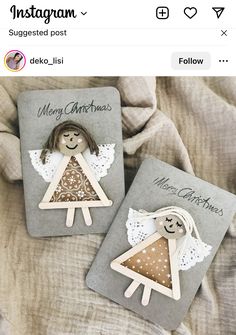 two wooden christmas cards with angels on them