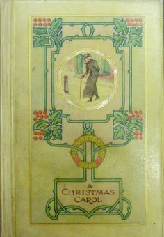 the front cover of a christmas carol book