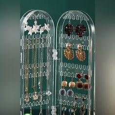 the earring display is clear and holds many pairs of earrings