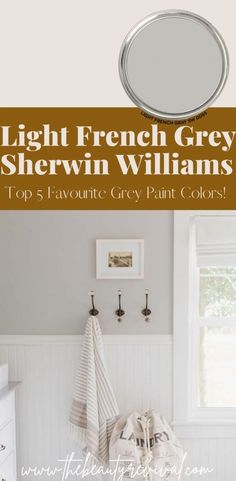 the light french grey shelving in a bathroom with white walls and wood flooring