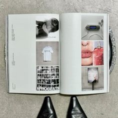 an open book with pictures and text on the page, next to two black shoes