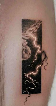 a black and white photo with lightning coming out of the sky on a man's arm