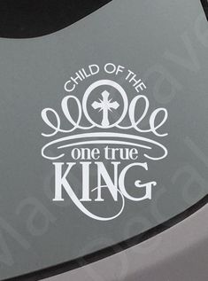 a sticker that says child of the one true king with a cross on it