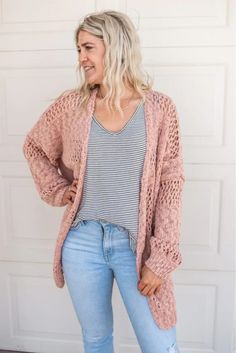 This timeless cardigan is chic for year round wear. Style it with a tank and jeans for cooler days or throw over a swimsuit for a beach vacation. You can show it off any time of year!Model is 5'6", size 34B bust, and shown wearing a size smallSlightly oversized fit Trendy Pink Soft Knit Cardigan, Feminine Pink Knit Cardigan, Bohemian Pink Knit Cardigan, Blush Cardigan, Pink Floral Print Long Sleeve Cardigan, Long Sleeve Pink Floral Print Cardigan, Cute Cardigan Outfits, Fall Outfits 2022, Cardigan Fall Outfit