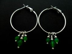 "This is a pair of pretty silver plated 30mm (just over 1\") hoop and green jade bead earrings. Thanks for looking!!" Nickel-free Green Sterling Silver Hoop Earrings, Green Sterling Silver Small Hoop Earrings, Green Metal Dangle Hoop Earrings, Green Dangle Metal Hoop Earrings, Green Dangle Hoop Earrings In Metal, Silver Hoop Earrings With Dangling Beads, Green Jade Hoop Earrings, Green Small Hoop Metal Earrings, Green Hoop Earrings With Dangling Beads