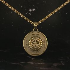 This is a Sri Yantra necklace, a handmade jewelry. This unisex necklace is the perfect gift for him and her any time of the year  Unlock the power of divine geometry and embrace spiritual enlightenment with our handmade Sri Yantra necklace. Immerse yourself in the sacred symbol's profound energy as you embark on a journey of self-discovery and cosmic connection. Handmade with meticulous care and attention to detail, each necklace is a unique expression of spiritual artistry. The Sri Yantra, know Divine Geometry, Divine Masculine And Feminine, Metal Art Jewelry, Cosmic Connection, Beautiful Pendants, Divine Masculine, Masculine And Feminine, Sri Yantra, Hinduism Art