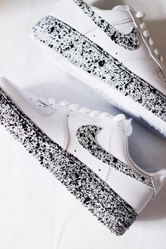 Introducing the "Cookies and Cream" custom sneakers—where bold meets classic. These all-white Air Force 1 Lows are transformed with a dynamic black paint splatter design, creating a striking contrast that’s as fresh as it is edgy. Each pair is uniquely hand-painted, ensuring no two are exactly alike. Perfect for those who love to stand out with a touch of artistic flair. Hand/spray paint splatter "cookies & cream" design. Resistant clear coat (protected against cracks and scratches). Custom made Spray Paint Splatter, All White Air Forces, Black Paint Splatter, White Air Force 1, White Air Forces, Painted Sneakers, Wedding Sneakers, Custom Air Force 1, Air Force 1 Low