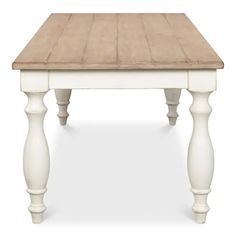 a wooden table with white legs and wood top