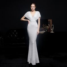 This Dress is fashionable for every occasion. the dress is made-to-order by professional tailors. You can choose from 50 colors, Regular sizes 2 to 16 and plus sizes 14w to 26W. Custom size is also available.. The product details: Color: White, Length: Long, Silhouette: Mermaid, Neckline: V-Neck, Primary Fabric: Sequin Elegant V-neck Mermaid Dress For Banquet, Elegant V-neck Mermaid Dress For Prom Season, Elegant V-neck Mermaid Dress With Sequins, New Years Cocktails, Dresses With Beading, Red Champagne, Gold Sequin Dress, Evening Dress Fashion, Women's Evening Dresses