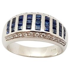 Blue Sapphire with Cubic Zirconia Ring set in Silver Settings Width: 2.0 cm Length: 1.0 cm Ring Size: 55 Total Weight: 5.88 grams *Please note that the silver setting is plated with rhodium to promote shine and help prevent oxidation. However, with the nature of silver, oxidation may occur over time and use. "We first opened doors in 1980 when it was then situated in the vicinity of the Victory Monument; a small and modest storefront with a couple of counters. From its humble beginnings to where Cubic Zirconia Rings, Ring Set, Ring Sets, Blue Sapphire, Band Rings, Monument, Cubic Zirconia, Jewelry Rings, Sapphire