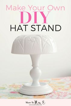 a white lamp with the words make your own diy hat stand on top of it