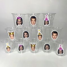 a group of plastic cups with pictures of people wearing crowns on top of each one