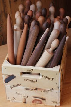 a wooden box filled with lots of different types of wood