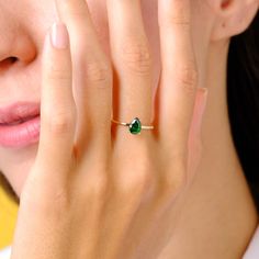 Here is Teardrop Emerald Ring Gold 14K for Mother. Our Pear Raindrop Cut Birthstone Ring Gold 10K is use as Tear Drop Green Gemstone Ring 18K for women. Single Stone Ring looks like mindful gift for her birthday. Teardrop emerald ring will be perfect gift shower on her birthday or anniversary night.  Emerald ring gold can be customized as her birthstone or birth month stone. We can turns it into a 14K emerald raindrop ring for her as a pear cut birthstone ring. Our tear drop gemstone ring and solitaire stack ring will be great and stunning birthday gifted symbolizes your love and serves as the ideal gift for your mummy, mama or mum. Please check our other birthstone rings: https://www.etsy.com/shop/minifinejewels?ref=seller-platform-mcnav§ion_id=40182033 Jewelry Details: Gold Type: 14K Car Fine Jewelry Pear-shaped Yellow Gold Birthstone Ring, Yellow Gold Pear-shaped Birthstone Ring, Teardrop Emerald Ring In Yellow Gold, 14k Gold Teardrop Ring, Green Teardrop 14k Gold Ring, Pear-shaped Birthstone Promise Ring, Teardrop Emerald Ring Fine Jewelry, Fine Jewelry Emerald Teardrop Ring For May Birthstone, 14k Gold Teardrop Emerald Ring For Anniversary