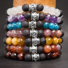 This Listing Is For Seven (7) Handmade Chakra Aromatherapy Bracelets That Are Made Of 8 Mm White Jade, Amethyst, Apatite, Strawberry Quartz, Blonde Tiger Eye, Fire Agate, Red Tiger Eye, And Lava Rock Beads, On Latex Free Elastic Cord. Pewter Focal Beads Finish Each Bracelet. Our Handmade, Aromatherapy Bracelets Combine The Healing Power Of Crystals With The Benefits Of Essential Oils And Aromatherapy. You Can Add A Drop Or Two Of Your Favorite Essential Oil, To The Lava Rock Beads, To Assist In Bringing Your Chakras Into Balance, Or Just To Enjoy The Fragrance All Day Long. Here Are The 7 Crystals And The Chakras They Balance: White Jade Crown Amethyst Third Eye Apatite Thro Chakra Aromatherapy, Benefits Of Essential Oils, Power Of Crystals, Crystal Reiki, Aromatherapy Bracelet, Aromatherapy Jewelry, Red Tiger, Bracelets Diy, Red Tigers Eye