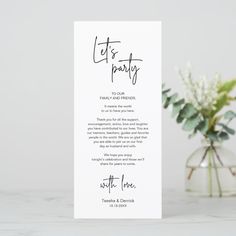 a white card with the words let's party written on it