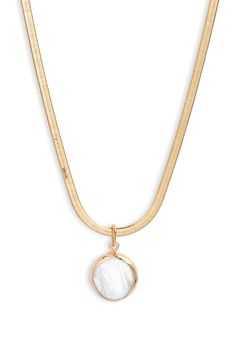 This pretty, minimalist necklace handmade in 24-karat-gold plate is beautifully anchored by a bezel-set coin pearl. 18" length Pearl size: 14.5–15mm 24k-gold plate/freshwater pearl Made in the USA Gold Pearl Round Pendant Charm Necklaces, Gold Pearl Charm Necklaces With Round Pendant, Gold Pearl Jewelry With Coin Pendant, Gold Coin Necklace With Pearl Chain, Gold Pearl Necklace With Coin Pendant, Elegant Gold Coin Necklace With Pearl Charm, Gold Coin Necklace With Pearl Chain For Gift, Gold Coin Necklace With Pearl Chain As Gift, Gold Pearl Necklace With Round Pendant