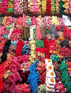 there are many different types of candies on display