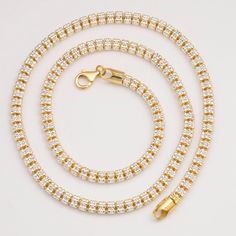 5mm Two-Tone Ice Link Chain 14K Yellow Gold-Plated Silver 925 Italy * Metal : Real Sterling Silver (Properly Stamped, 925) * Condition : Brand New * Finish : Polished * Average Weight : 22" : 33.62 grams * Length : Selectable * Width : 5mm = 3/16" * Clasp/Bail : Lobster Lock All of our items are brand new and are shipped with a gift box. Gold Iced Out Round Tennis Necklace, Gold Iced-out Tennis Necklace, Solid Gold Bracelet, Gold Bond, Solid Gold Chains, Solid Gold Earrings, Silver Chain Bracelet, Gold Collection, Chains For Men