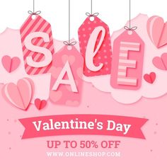 valentine's day sale sign with hearts hanging from strings