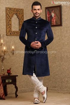 Elegant Navy Blue Sherwani for Wedding Online 2021 – Nameera by Farooq Designer Blue Sherwani With Dabka Work, Eid Velvet Fitted Bandhgala, Fitted Velvet Bandhgala For Eid, Formal Blue Sherwani With Naqshi Detailing, Formal Blue Sherwani With Naqshi, Velvet Bandhgala For Eid Festivities, Festive Velvet Fitted Sherwani, Festive Velvet Sherwani For Wedding, Embroidered Velvet Sherwani For Wedding