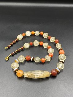 A Unique and rare ancient Himalayan Ancient antique crystals and carnelian beads necklace mala very unique and rare The age of this beads are more than 1000 years old The origin of this beads from Nepal Himalaya they were used as amulets and in prayer mala we provide fast and free shipping service world wide Spiritual Amber Beads And Cabochons With Natural Stones, Spiritual Amber Beads With Natural Stones, Amber Amulet Beaded Necklace For Healing, Carnelian Amulet Beaded Necklace For Healing, Amber Gemstone Beads Amulet Necklace, Carnelian Agate, Name Necklaces, 1000 Years, Carnelian Beads