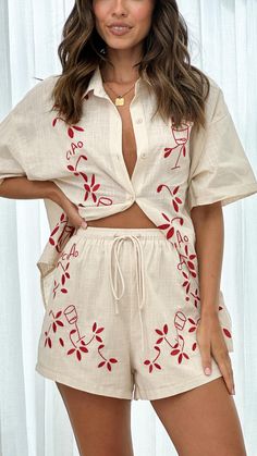 Embrace effortless style with this relaxed fit, collared shirt set. Featuring red embroidered details, functional buttons, and short sleeves, this set is perfect for any occasion. Cheap Casual Embroidered Sets, Luxury Red Printed Sets, Luxury Cotton Sets With Buttons, High Waist Fashion, Embroidered Details, Tres Chic, Swimwear Cover, Collared Shirt, Women's Shirts