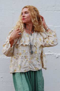 Magnolia Pearl Eadred Eyelet Blouse in Lauretta ♡ Product Highlights ♡ Our Magnolia Pearl Eadred Eyelet Blouse in Lauretta blends the influences of the far-flung, woven together in a supple and stable homage to the homespun. Spinning in this great web of being, under the sun. As a layered flourish or a standalone statement, our Eadred Eyelet Blouse exudes tenderness and true beauty - a new nostalgia that beckons the senses to dream in all directions. For the urban mystic, the jaunty jester momma Bohemian Spring Top With Lace Trim, Spring Festival Blouse With Boho Collar, Spring Festival Boho Collar Blouse, Spring Daywear Tops With Boho Collar, Spring Boho Collar Tops For Daywear, Spring Peasant Top With Boho Collar, Spring Bohemian Daywear Blouse, Pearl Jacket, Eyelet Blouse