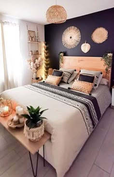 a bed room with a neatly made bed