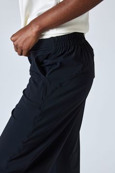 Our famous style in classic black. These pants are a standout yet comfortable pair. Style with your favorite blouse or top for an easy, everyday style. *We recommend taking one size down in this style if a closer fit is preferred. Hits above the ankle Slight stretch Relaxed fit Tapered leg Side pockets Versatile Black Pull-on Pants, Black Relaxed Fit Pull-on Pants, Black 4-way Stretch Wide Leg Pants For Work, Black Comfort Stretch Wide-leg Activewear, Black Wide Leg Comfort Stretch Activewear, Black Comfort Stretch Wide Leg Activewear, Black 4-way Stretch Bottoms For Workwear, Black Wide Leg 4-way Stretch Yoga Pants, Black Wide Leg Yoga Pants With 4-way Stretch